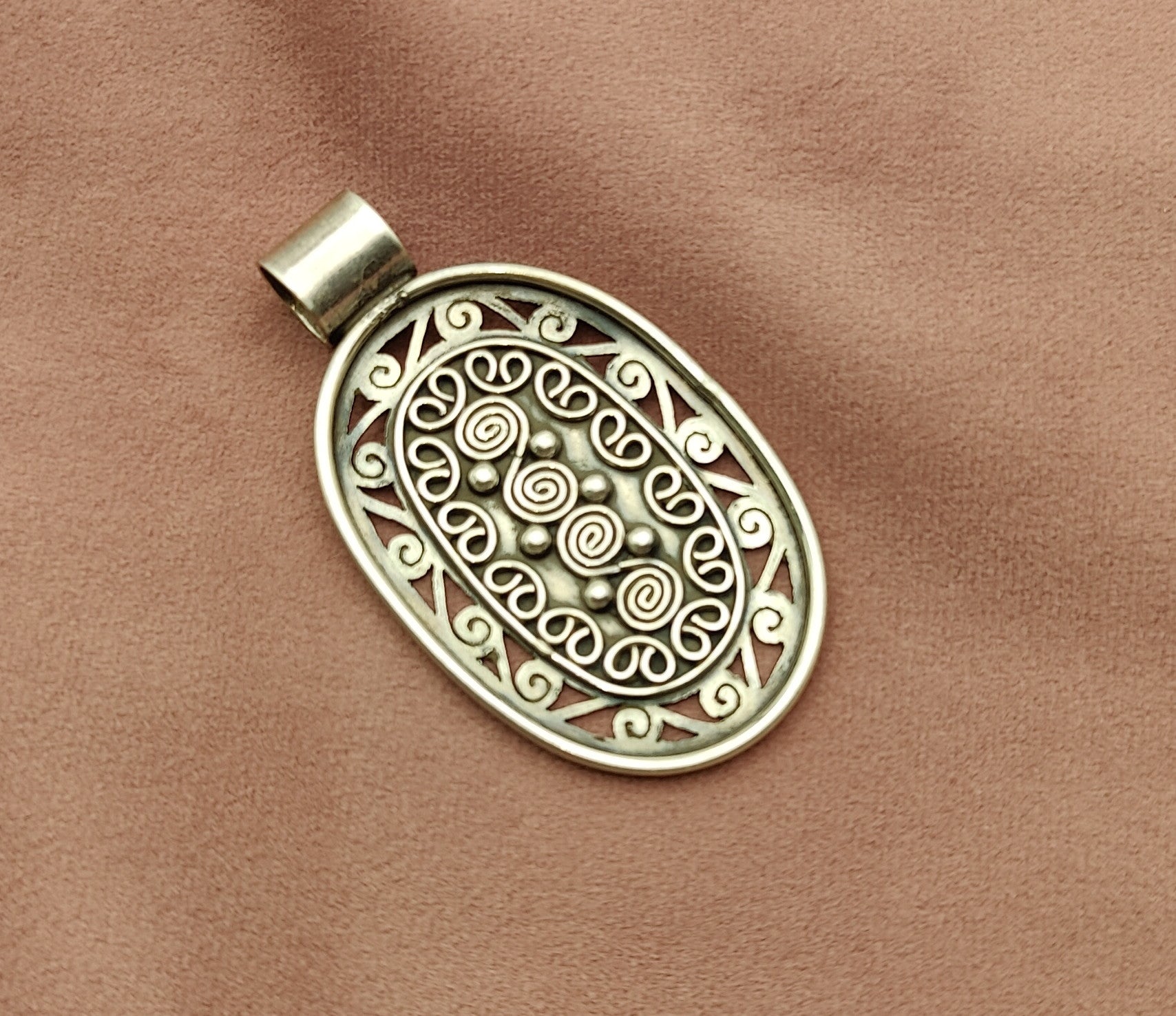 silver oval pendant