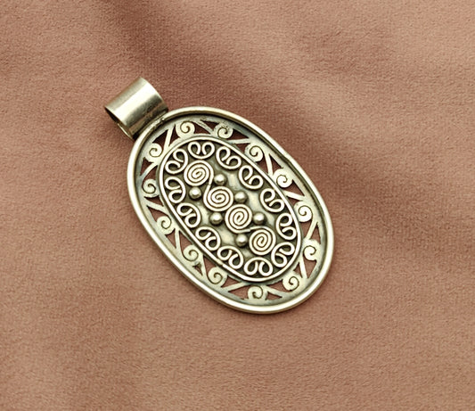 silver oval pendant