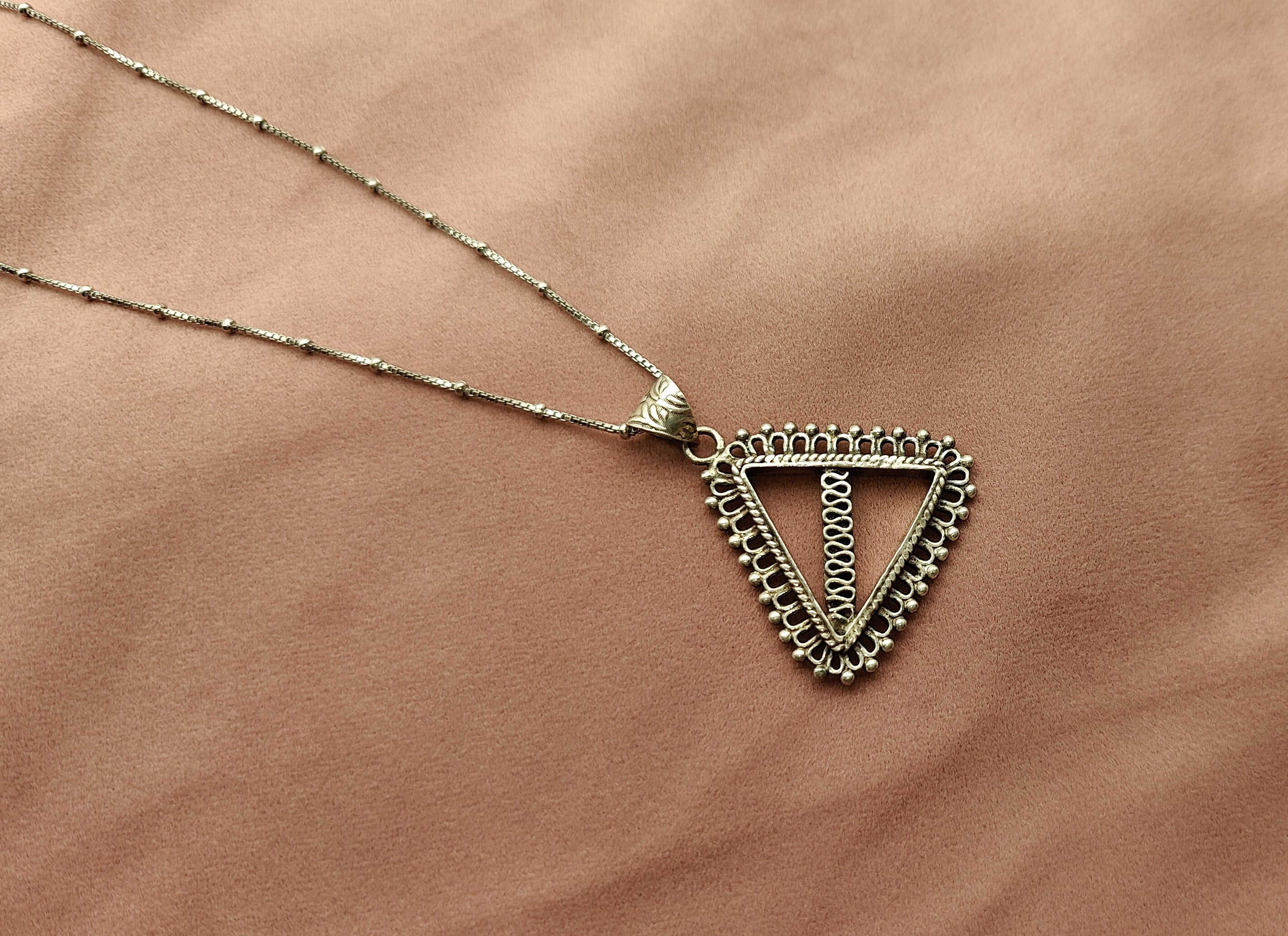 silver triangle pendant